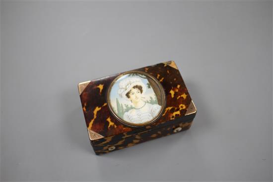 A late 19th century Swiss gold mounted tortoiseshell musical box, inset with a miniature of a young lady, width 8cm depth 5.5cm height